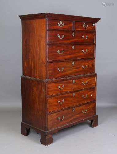 A late George III mahogany chest-on-chest, fitted with an ar...