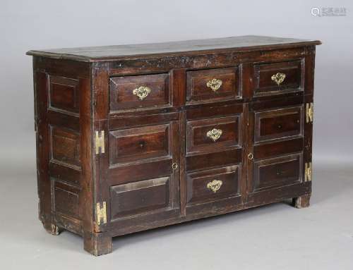A late 17th century oak dresser base, the three drawers abov...