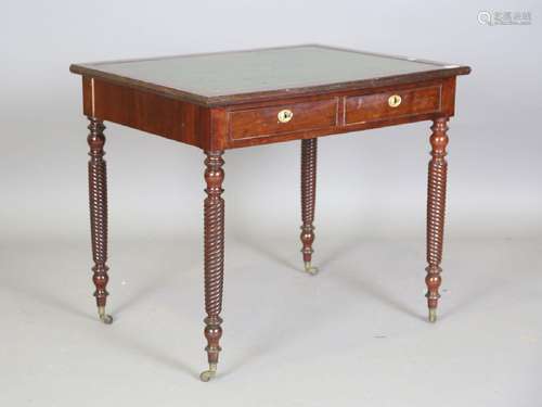 A 19th century mahogany writing table, fitted with two mahog...