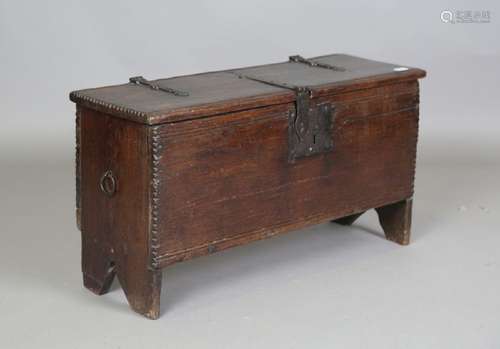 A 17th century oak six-plank coffer with notched edges and l...