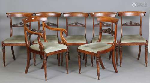 A set of seven Regency simulated rosewood beech framed dinin...