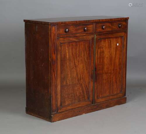 A Regency mahogany side cabinet, fitted with two drawers abo...