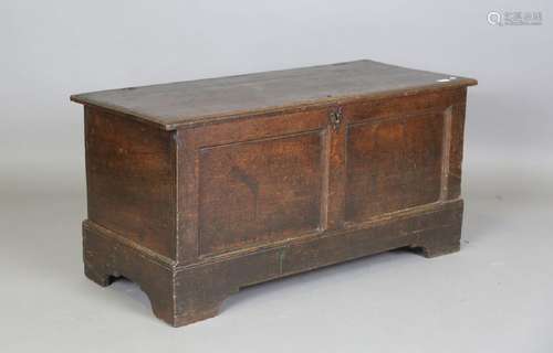 An 18th century oak panelled coffer, height 57cm, width 114c...