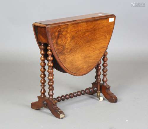 A late Victorian walnut 'baby' Sutherland table, the oval to...