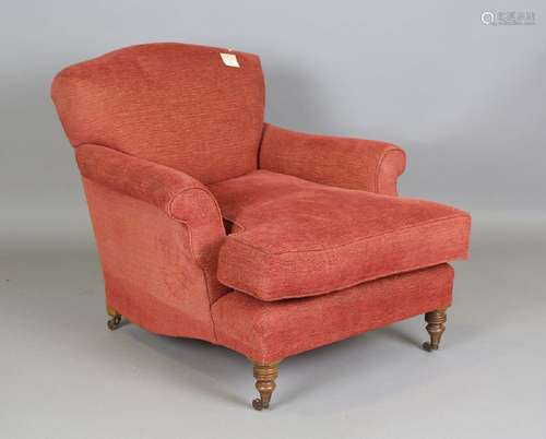 A modern Howard style armchair, possibly by George Smith, ra...