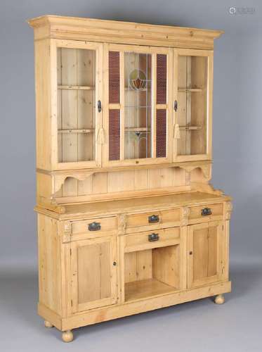 A 20th century pine kitchen dresser, the glazed top with a f...