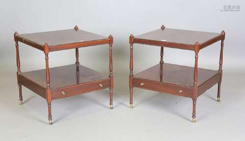 A pair of modern reproduction mahogany two-tier bedside tabl...