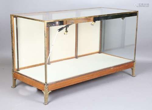 A mid-20th century walnut and brass framed shop counter disp...