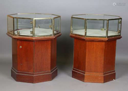 A pair of mid-20th century walnut and brass framed octagonal...