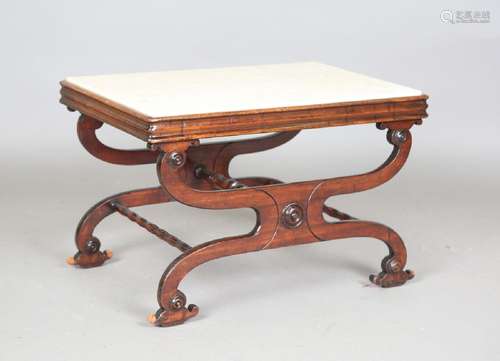 A Regency mahogany 'X' framed stand, the top inset with a la...