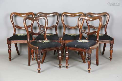 A set of six Victorian mahogany spoon back dining chairs wit...