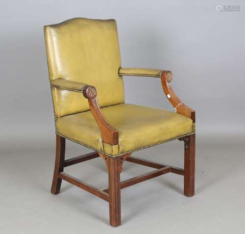 A 20th century George III style mahogany framed desk chair, ...