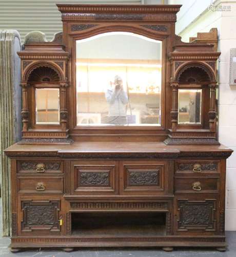 A large late Victorian walnut breakfront sideboard by James ...