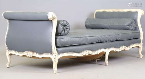 A large 20th century French cream painted showframe daybed, ...