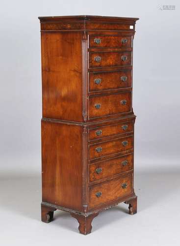 A 20th century reproduction walnut tallboy, fitted with eigh...