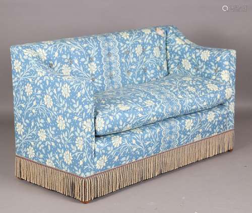 A modern two-seat settee, finely upholstered in foliate patt...