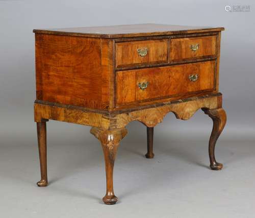 An 18th century and later walnut chest of three drawers, on ...