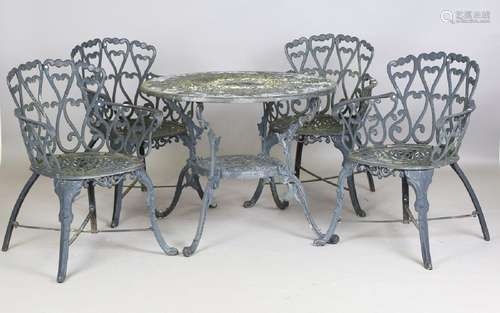 A 20th century cast metal circular garden table, height 66cm...