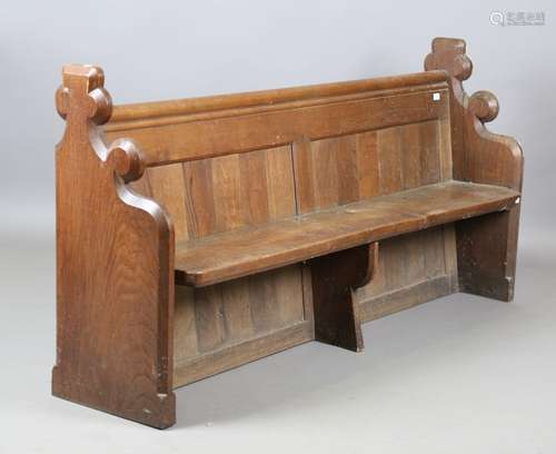 A late Victorian oak pew with shaped Gothic sides, height 91...