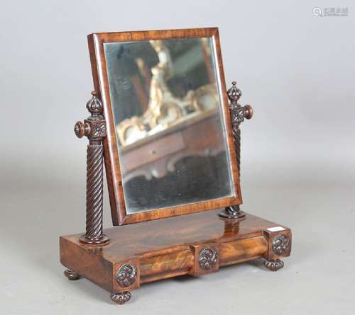 An early Victorian mahogany swing frame mirror, fitted with ...