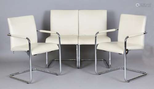 A set of four Hulsta D2 chairs, upholstered in cream leather...