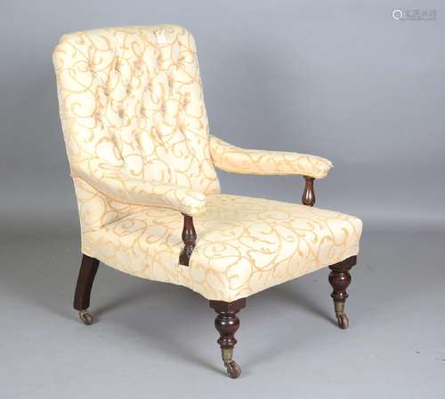 A Victorian mahogany gentleman's armchair, upholstered in bu...