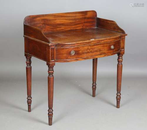 An early Victorian mahogany bowfront side table with a galle...