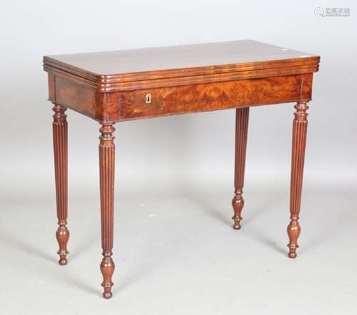 A mid-19th century figured mahogany fold-over card table, pr...