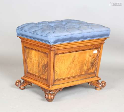 A mid-Victorian walnut box seat ottoman, the hinged seat uph...