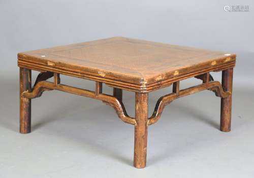 A Chinese softwood low occasional table, the top inset with ...