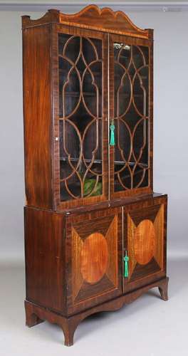 A George III Sheraton period mahogany library bookcase cabin...