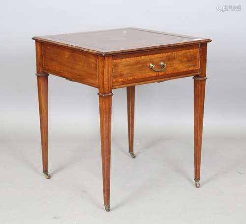 An Edwardian mahogany and satinwood crossbanded games table,...