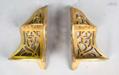 A pair of 20th century gilt painted corner wall shelves, hei...