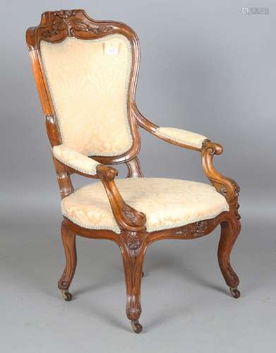 A late 19th century walnut showframe lady's salon armchair, ...