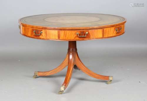 A late 20th century George III style mahogany drum-top libra...