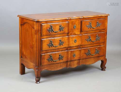 A 20th century French cherry serpentine fronted four-drawer ...