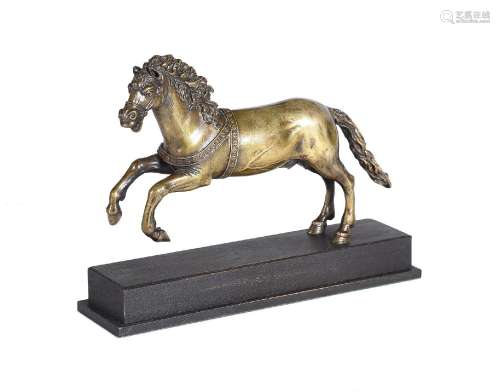 AN EQUESTRIAN BRONZE FIGURE OF A GALLOPING HORSE, PROBABLY I...
