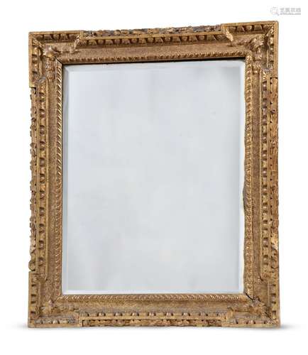 A GEORGE II CARVED GILTWOOD AND GESSO MIRROR, IN THE MANNER ...