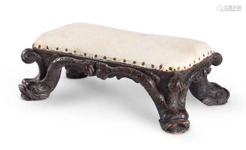 A SMALL CARVED BEECH STOOL, IN THE MANNER OF WILLIAM KENT, 1...