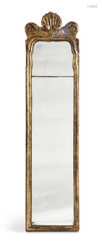 A GEORGE II CARVED GILTWOOD MIRROR, IN THE MANNER OF JOHN BE...