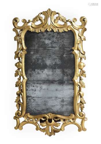 A GEORGE III CARVED GILTWOOD WALL MIRROR, PROBABLY IRISH, CI...