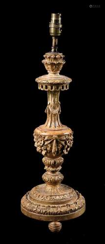 A CONTINENTAL CARVED GILTWOOD LAMP BASE, 19TH CENTURY AND LA...