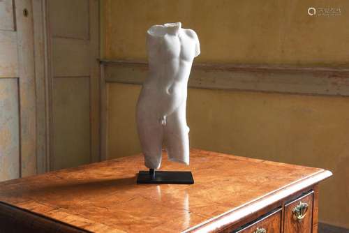 AFTER THE ANTIQUE, A MARBLE TORSO OF A YOUNG MAN, ITALIAN, 1...