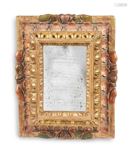 AN CARVED GILTWOOD AND PAINTED MIRROR, PROBABLY ITALIAN, 18T...