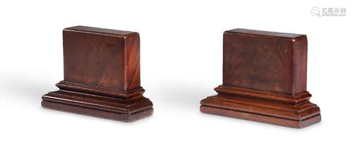 A PAIR OF REGENCY MAHOGANY BOOKENDS, IN THE MANNER OF GILLOW...