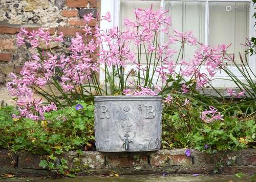 A GEORGE III LEAD CISTERN, DATED 1772