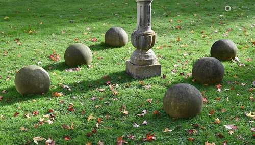 A SET OF SIX COMPOSITION STONE BALLS, 20TH CENTURY