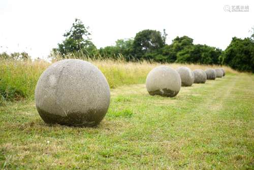 A LARGE PAIR OF STONE COMPOSITION BALLS, 20TH CENTURY