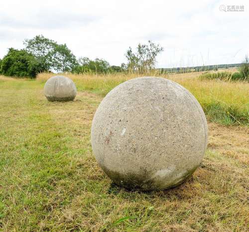 A LARGE PAIR OF STONE COMPOSITION BALLS, 20TH CENTURY