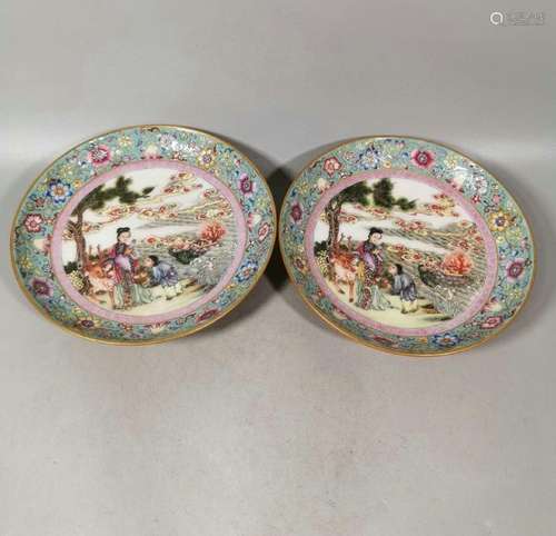 A pair of pastel figure plates